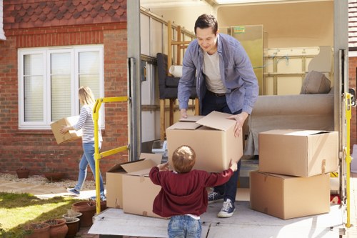 Packed household items ready for removal truck hire in Swiss Cottage