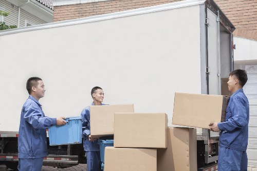 Careful loading of office items for a Swiss Cottage relocation