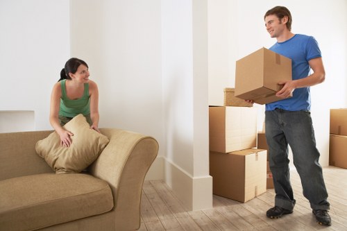 Professional movers assisting with a flat move in Swiss Cottage